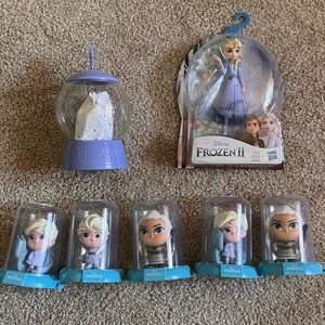 Group of Frozen collectibles